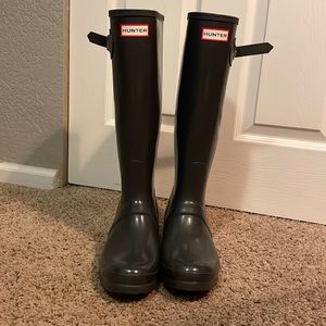Gray hunter rain boots.